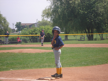 8 year old on first base